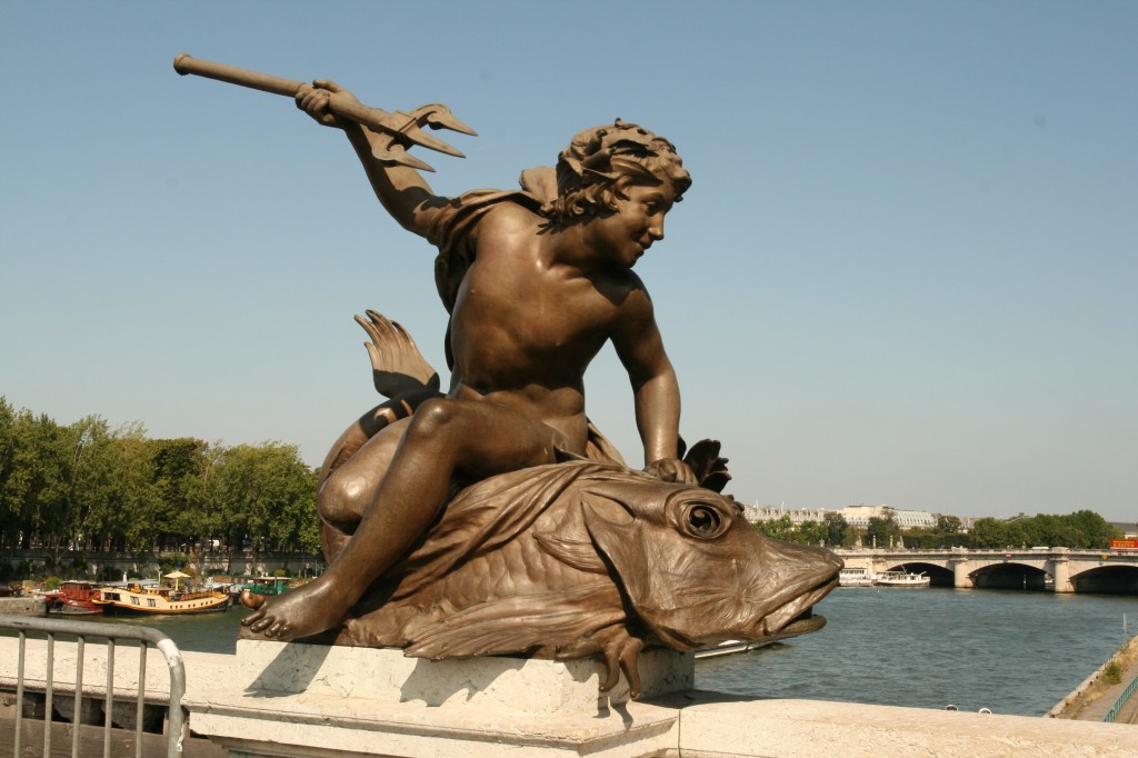 A statue on the Pont Alexandre III Bridge